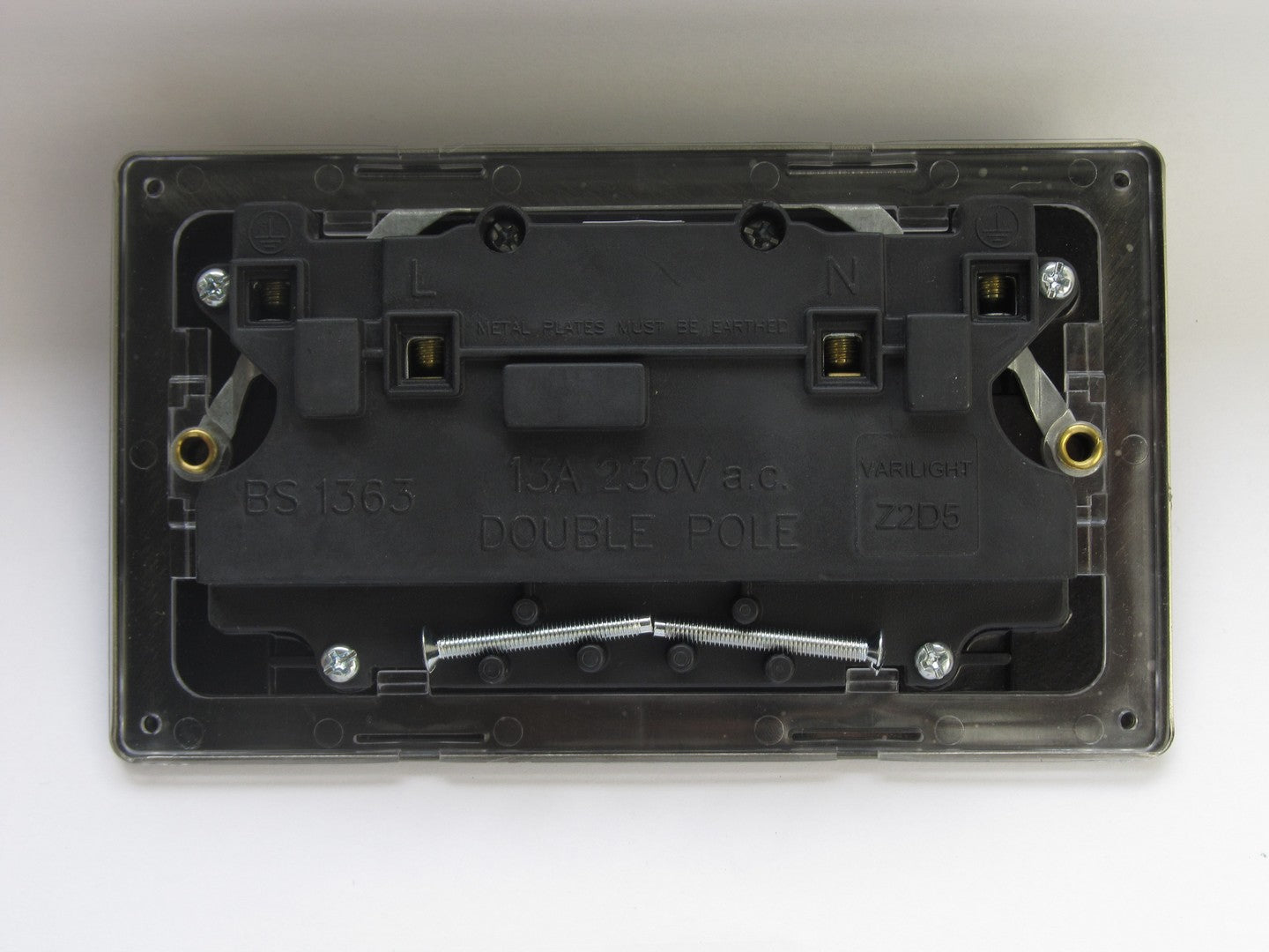 Black electrical wall plate on a white background