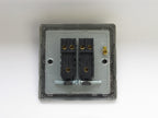 Electrical junction box with black connectors on a white background