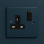 Hague blue electrical socket with black switch on a Hague Blue background